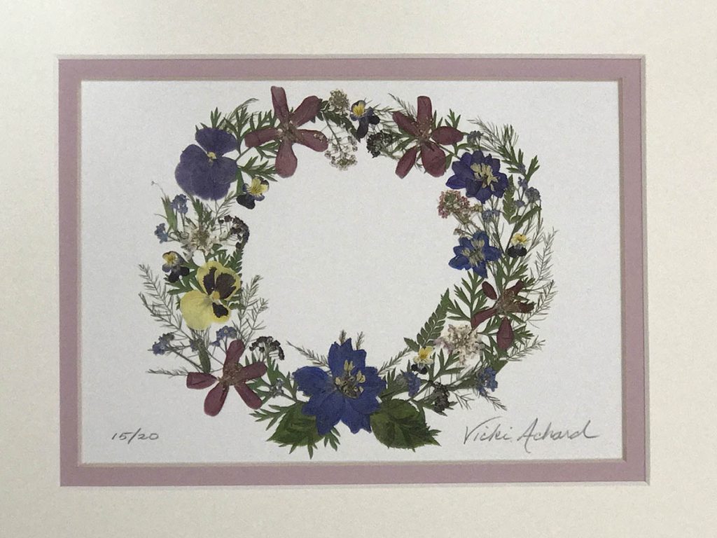 Pressed Floral print of flowers formed into a wreath - matted white outer mat and rose inner mat - edition 15 of 20